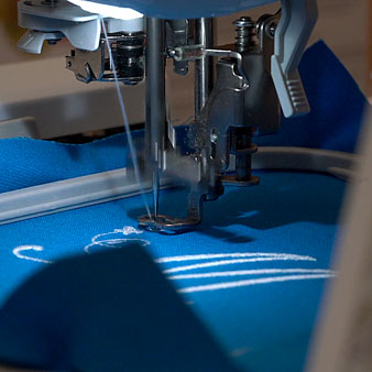 An embroidery machine in the King Library Makerspace is pictured applying a design to fabric